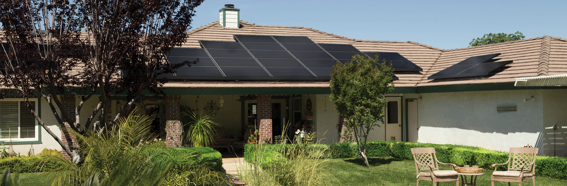 residential home with solar panels installed on the roof
